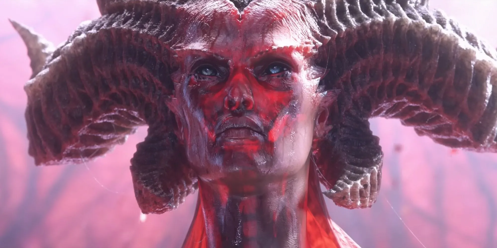 Lilith trong Diablo 4 với khuôn mặt đầy máu trong một cảnh cinematic ấn tượng