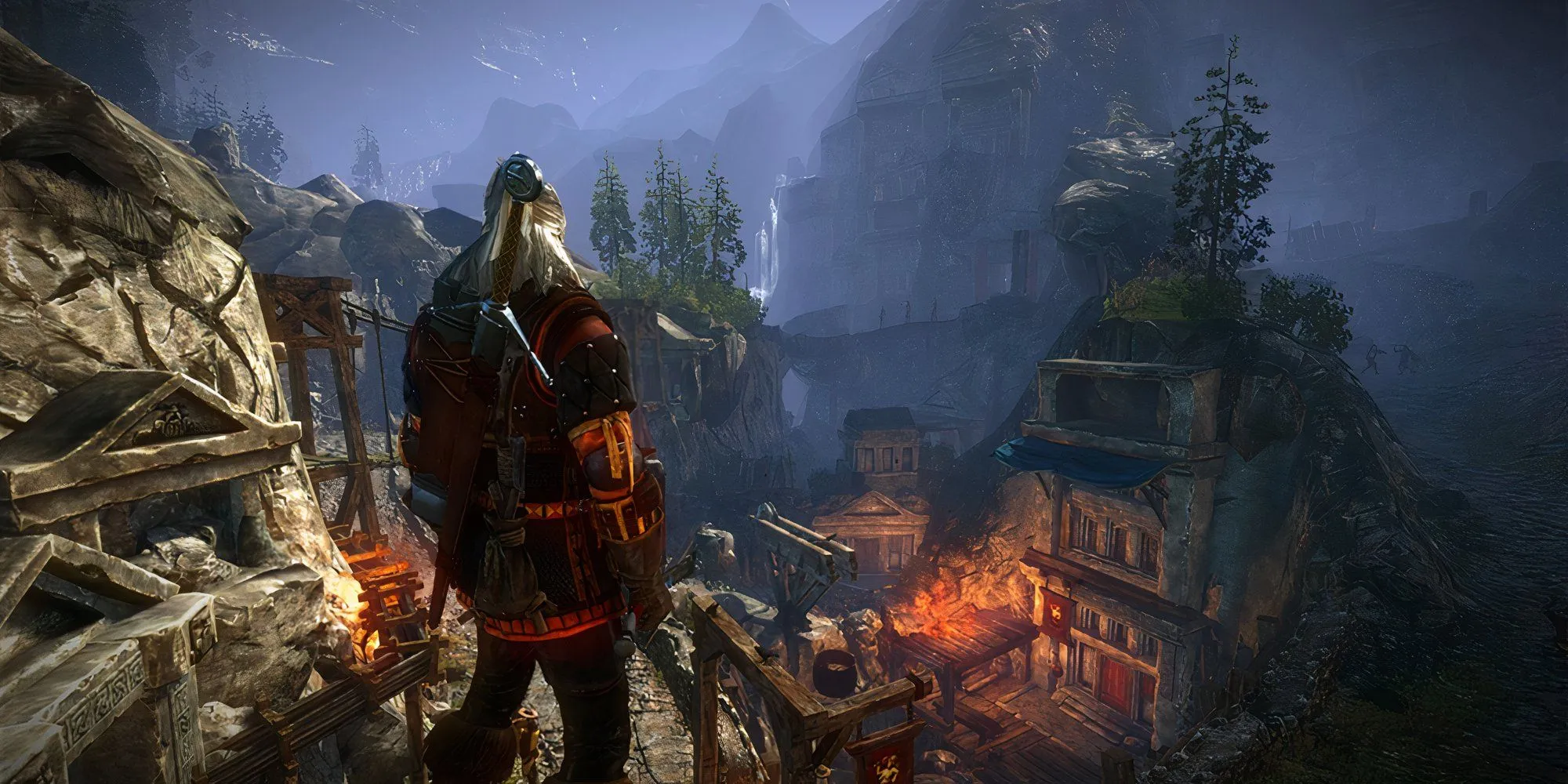 Geralt nhìn xuống thị trấn trong The Witcher 2: Assassins of Kings, gợi nhắc về hành trình trước The Witcher 3