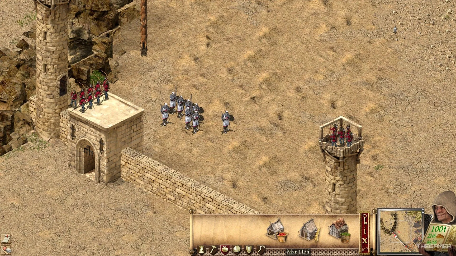 Kiếm sĩ và cung thủ Châu Âu phòng thủ cổng thành kiên cố, thể hiện chiến thuật bảo vệ trong Stronghold Crusader