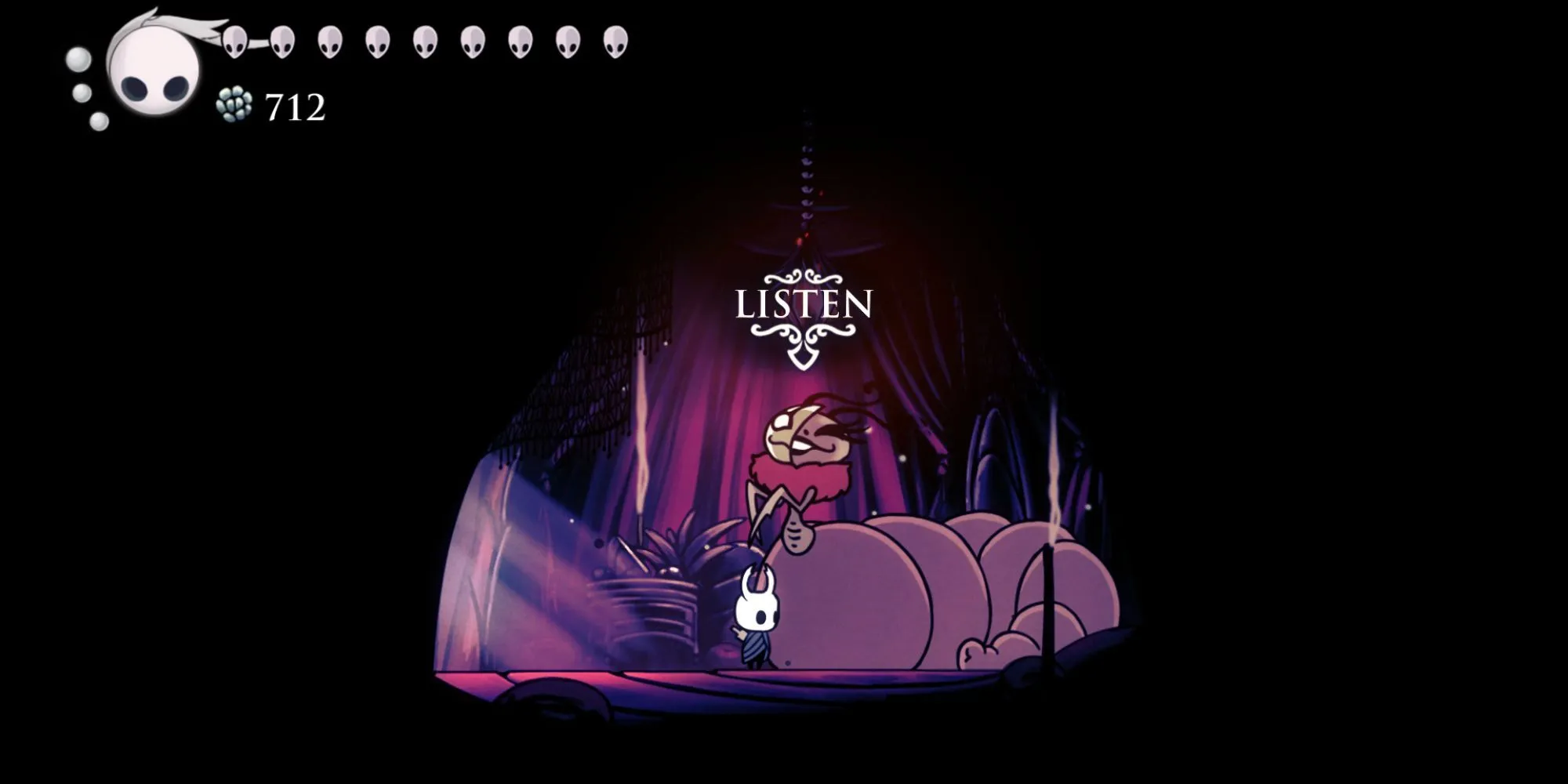 Nghệ nhân Divine và chiếc lều đặc trưng trong DLC Grimm Troupe, nơi nâng cấp Unbreakable Charms của Hollow Knight