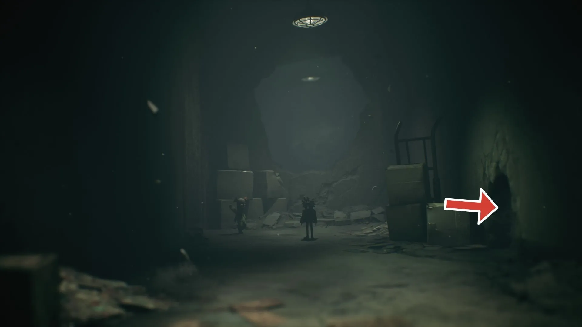 Chìa khóa trên thùng trong hốc tường — cần lấy để mở phòng có hồn ma cuối cùng Little Nightmares 3