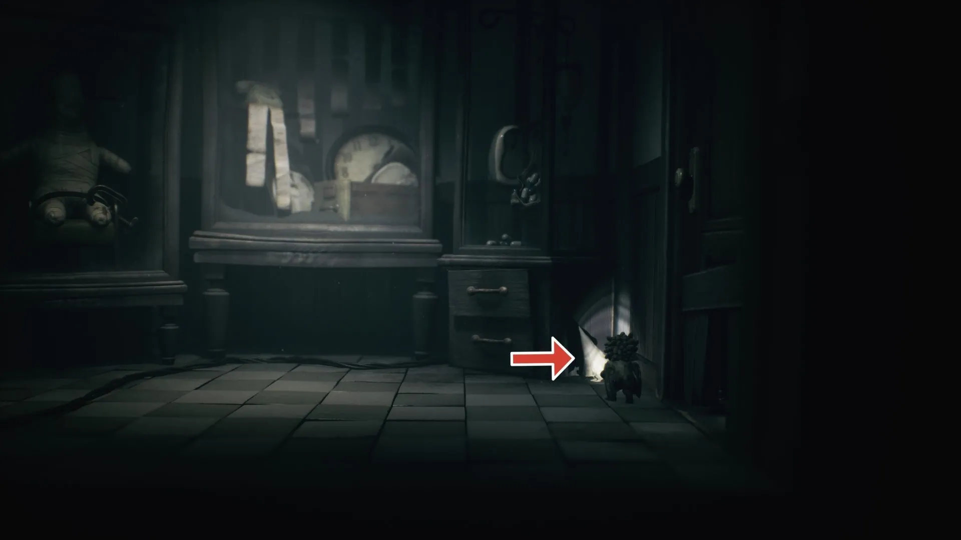 Nome thứ tư xuất hiện sau khi mở tủ trong phòng búp bê Little Nightmares 3